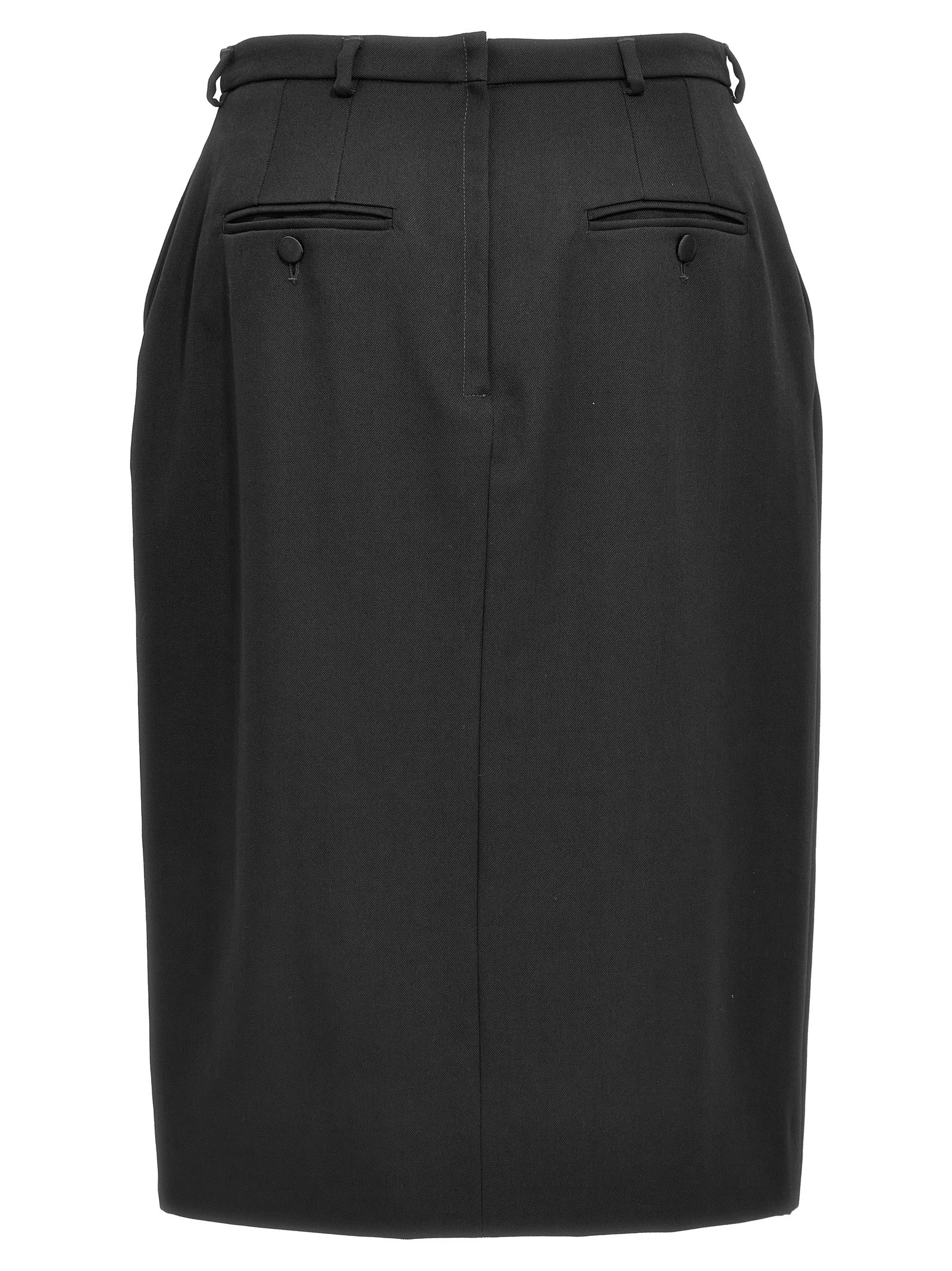 Jupe midi en laine vierge noire de Dolce & Gabbana, élégante et structurée, portée avec un style sophistiqué.