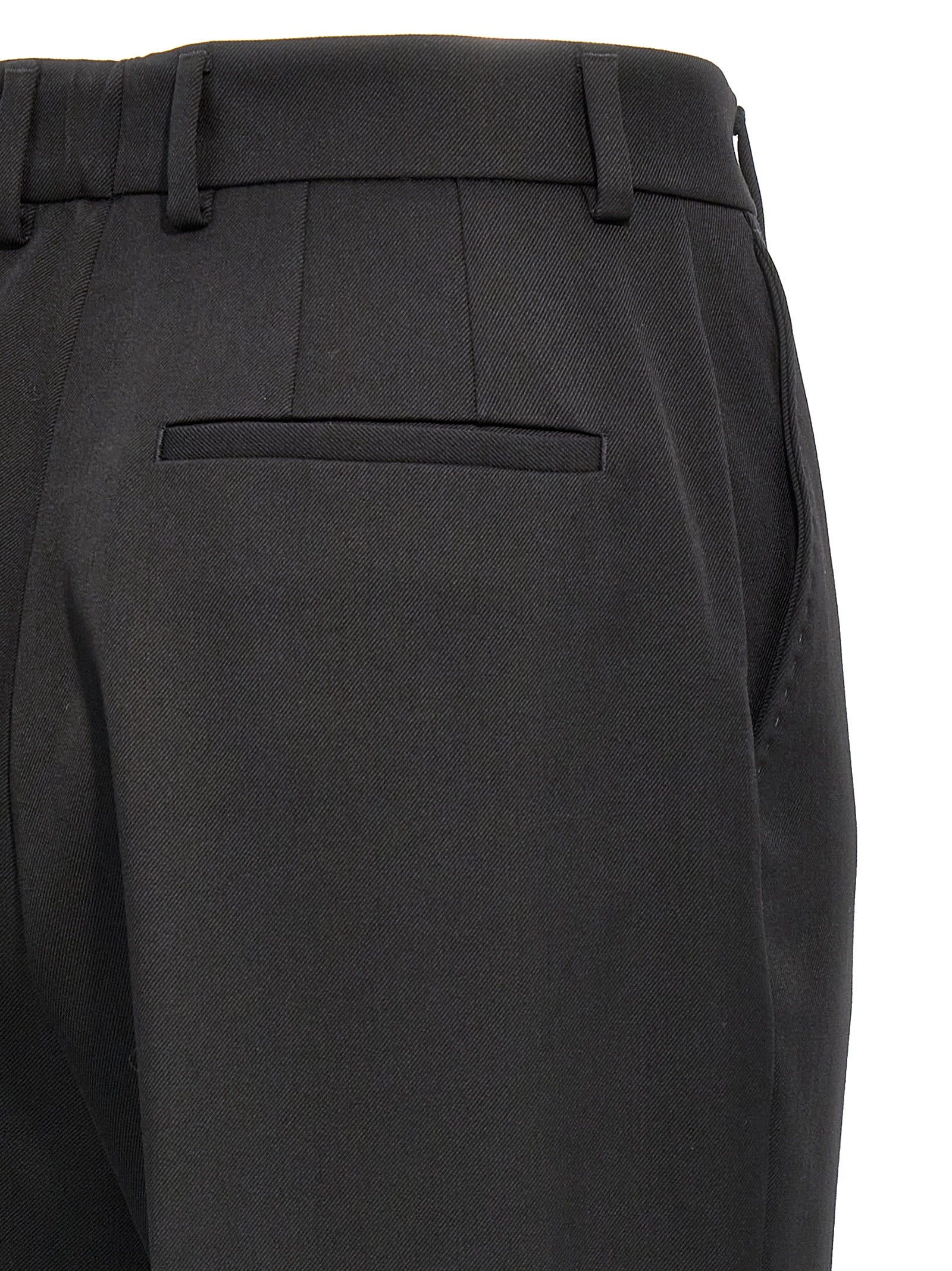 Pantalon noir en laine vierge de Dolce & Gabbana, pantalon élégant pour femme, vue en gros plan sur le tissu et la coupe.