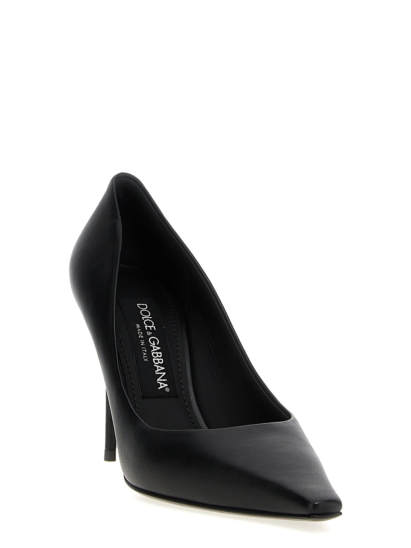 Escarpins noirs en cuir d'agneau Dolce & Gabbana avec talons hauts, visibles sur une surface claire.