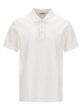 Chemise polo blanche en coton Burberry, vue de face, avec col et logo emblématique sur la poitrine.