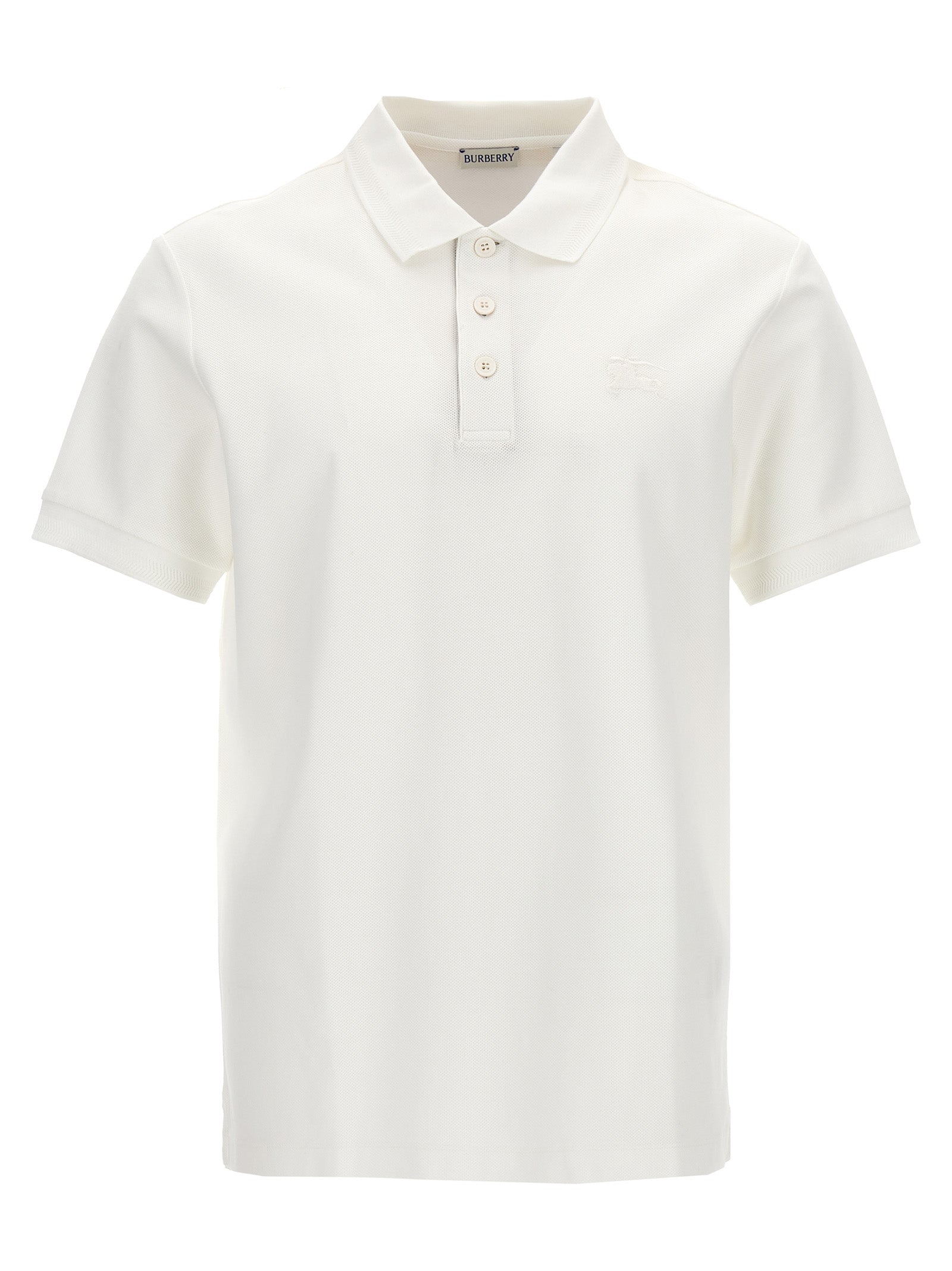 Chemise polo blanche en coton Burberry, vue de face, avec col et logo emblématique sur la poitrine.