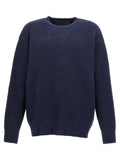 Cardigan en laine bleue Givenchy, vue de face, détails du col et des boutons, tissu doux et élégant.