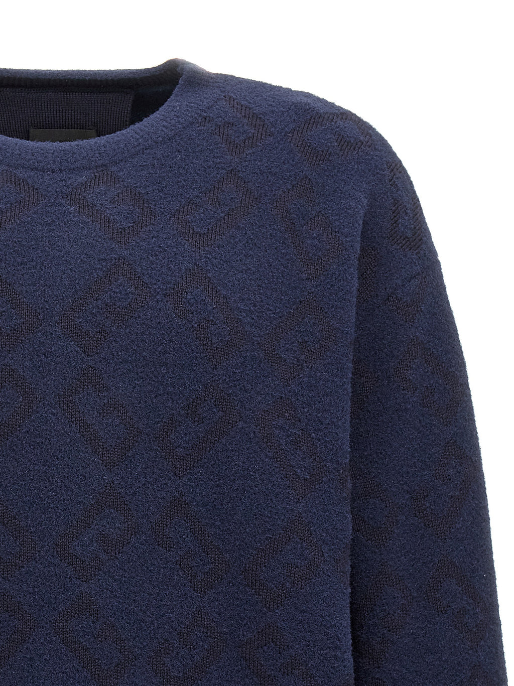 Cardigan en laine bleue Givenchy, coupe classique avec boutons, porté sur un mannequin, vue de face.