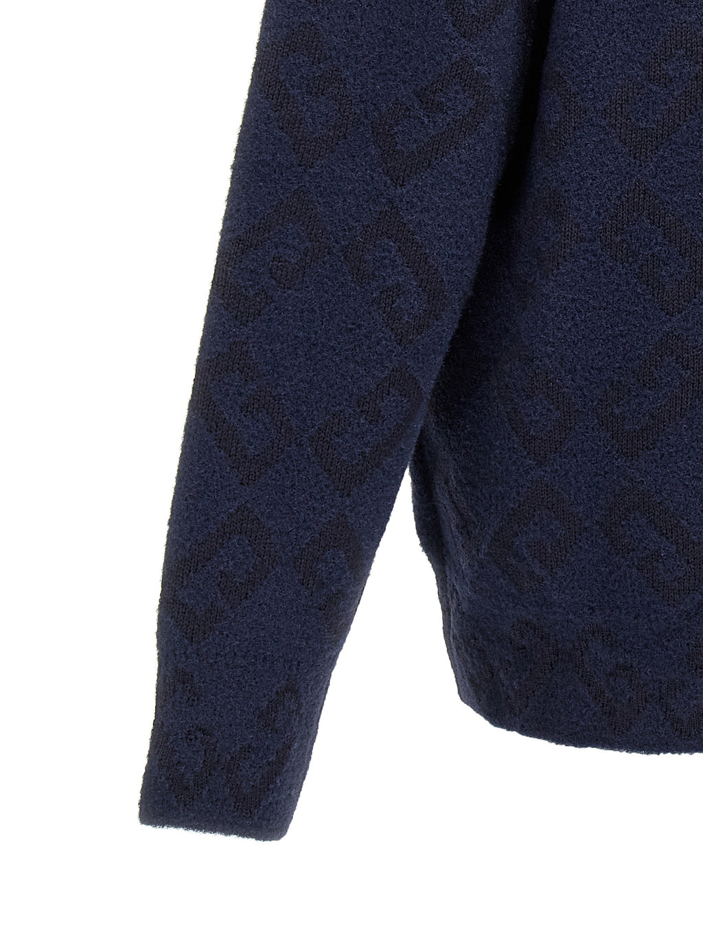 Cardigan en laine bleue Givenchy, style élégant avec col en V et boutons, porté sur un mannequin.
