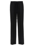 Pantalon décontracté en laine vierge noire de Dolce & Gabbana, style élégant et confortable pour un look chic.