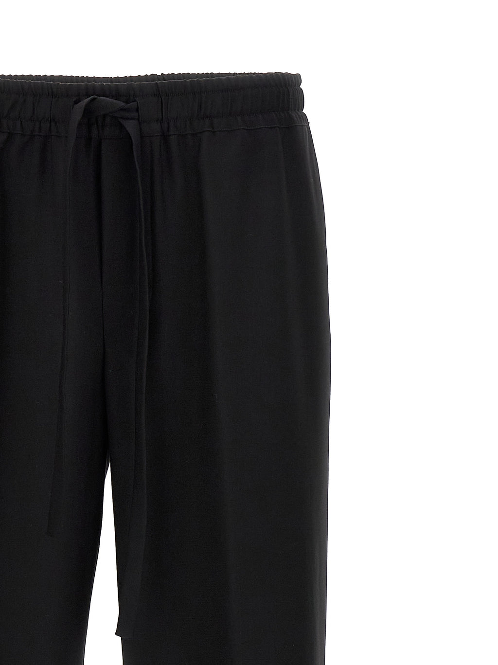 Pantalons décontractés en laine vierge noire de Dolce & Gabbana, style élégant et confortable pour homme.