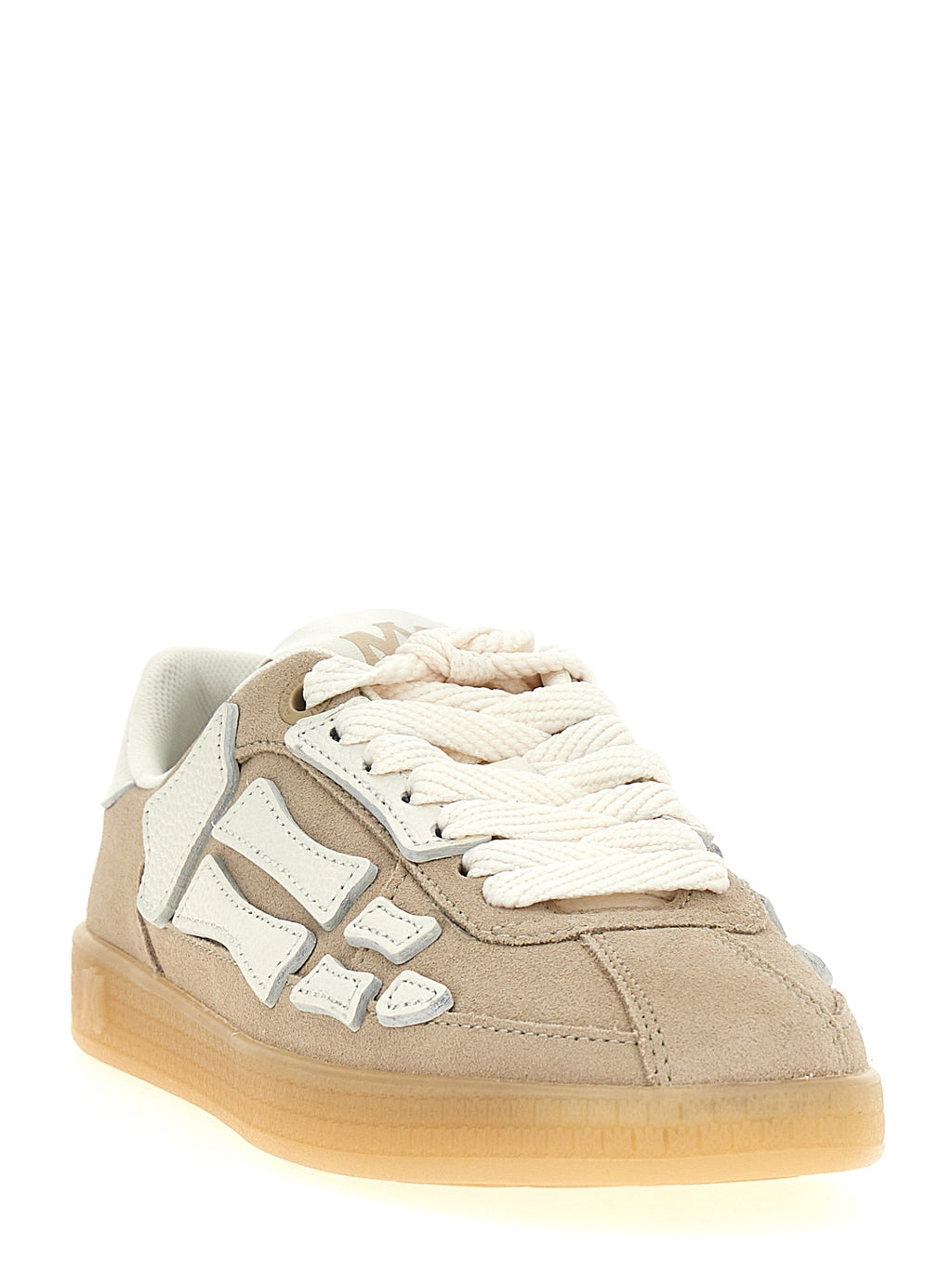 Sneakers beige en cuir de vachette de la marque Amiri, vue de face, avec détails de design modernes et semelle blanche.