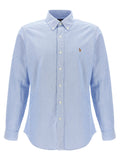 Chemise en coton bleu Polo Ralph Lauren, blouse élégante avec col classique et manches longues, vue de face.