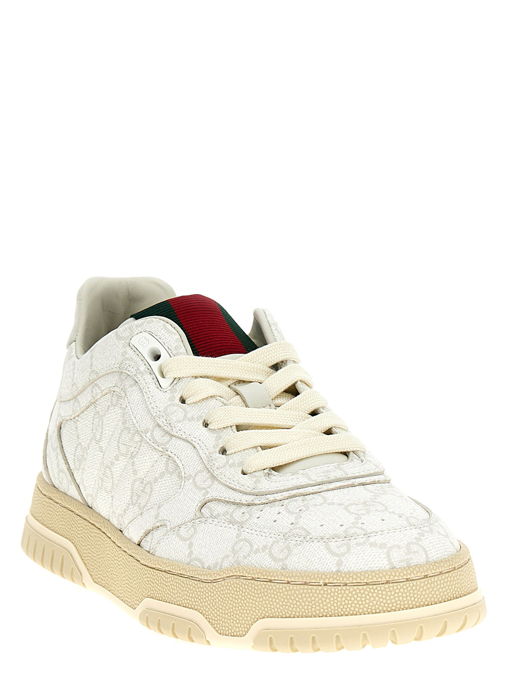 Sneakers blanches Gucci en polyethylene, vue de face, avec design épuré et logo Gucci visible sur la chaussure.