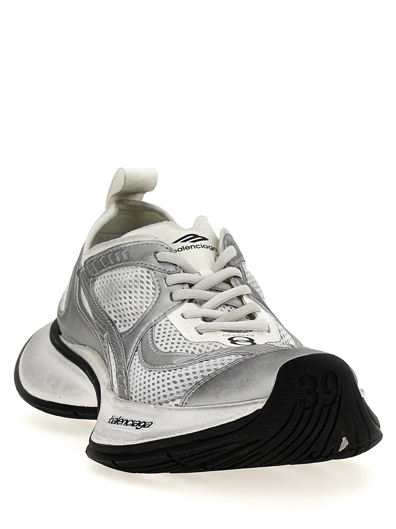 Chaussures de sport grises Balenciaga en polyester, baskets athlétiques modernes avec semelle épaisse et design tendance.