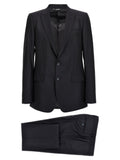 Costume deux pièces en laine vierge bleue Dolce & Gabbana, veste et pantalon élégants, pour homme, porté sur un mannequin.