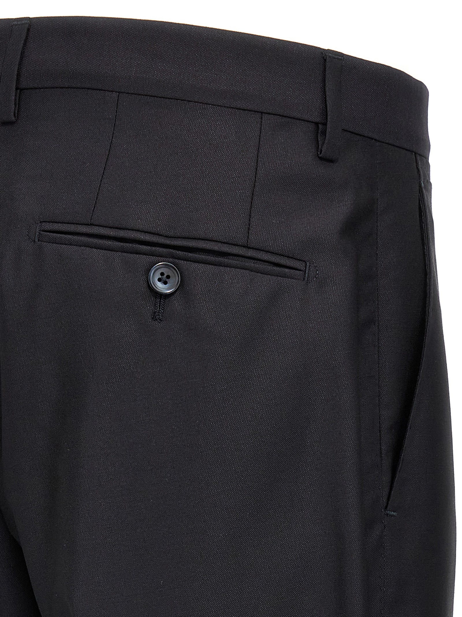 Costume deux pièces en laine vierge bleue Dolce & Gabbana, veste et pantalon élégants, mode sophistiquée pour homme.