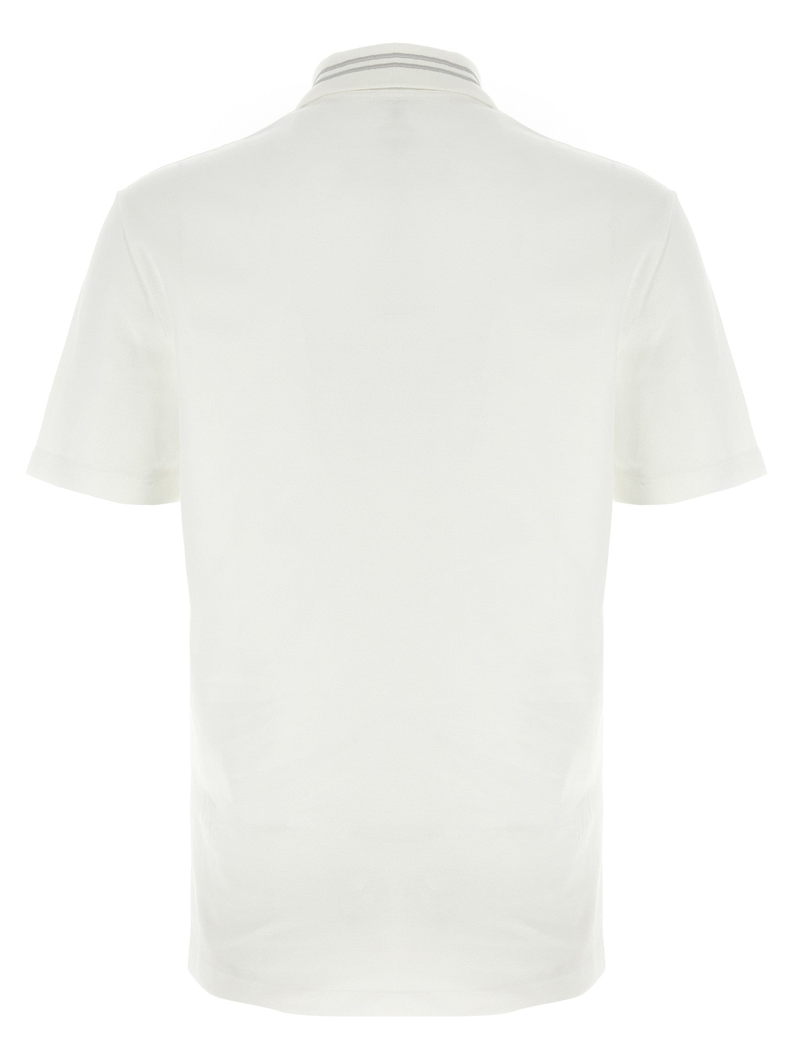 Chemise polo blanche en coton de Versace, vue de face, avec logo emblématique visible, style élégant et classique.