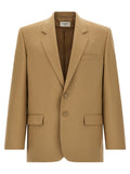 Blazer en laine beige Saint Laurent porté, détail élégant avec col classique et coupe ajustée, mode sophistiquée pour homme ou femme.