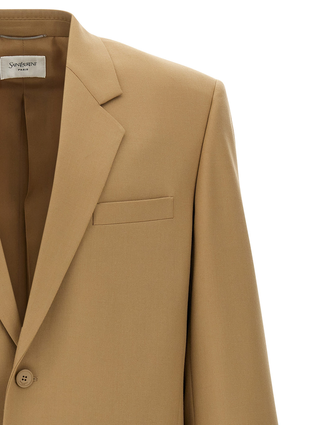 Costume beige en laine de Saint Laurent, blazer élégant avec revers et boutons, porté sur un mannequin.
