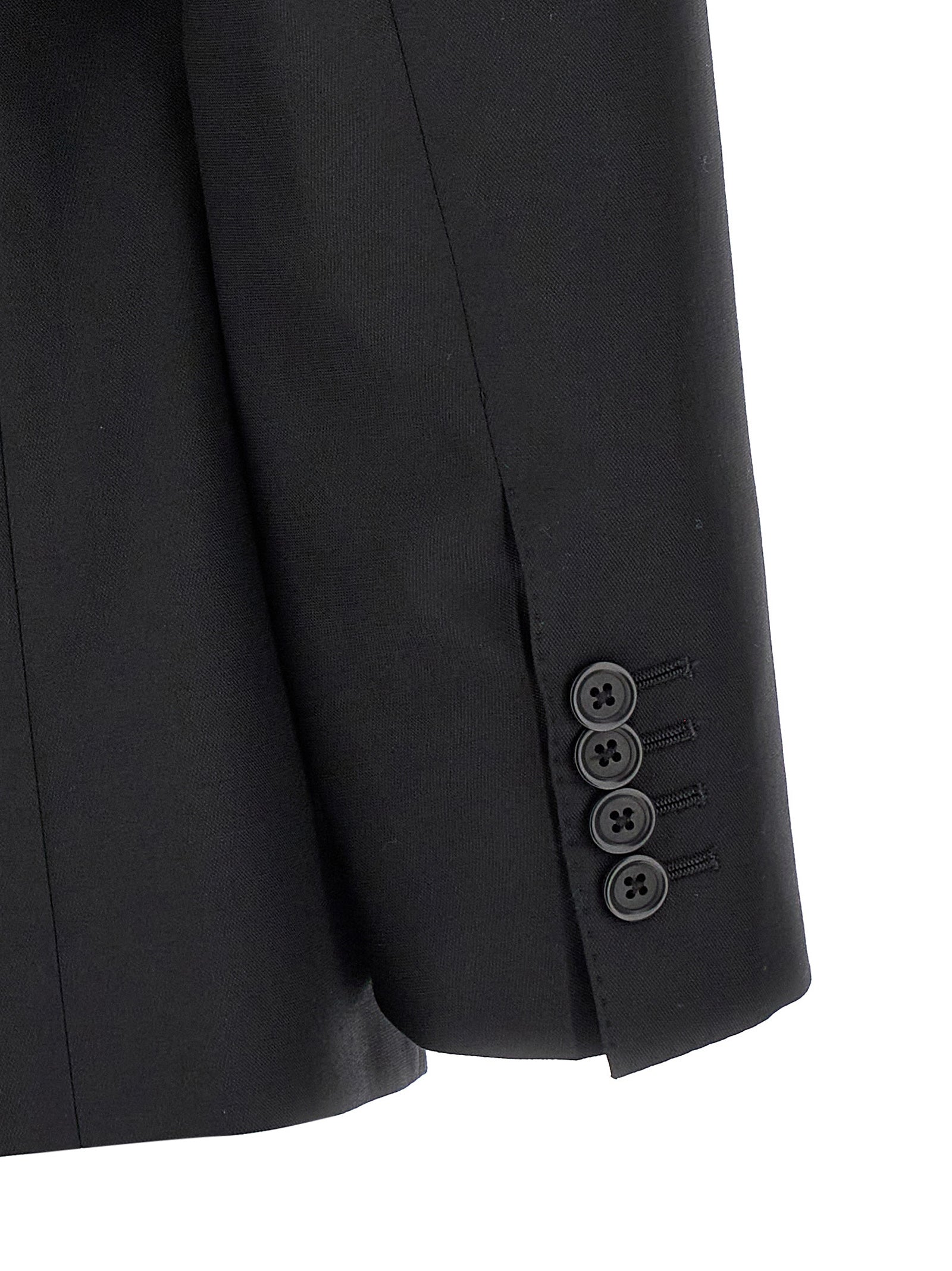 Costume deux pièces en laine vierge noire Dolce & Gabbana, veste et pantalon élégants pour homme.