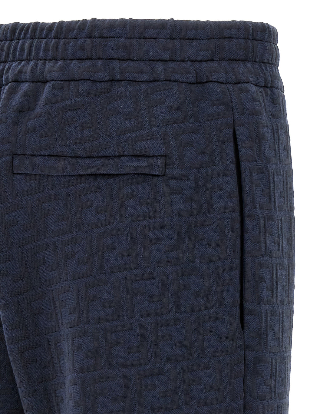 Pantalons de jogging Fendi en polyester bleu pour entraînement, avec logo discret visible sur le côté.