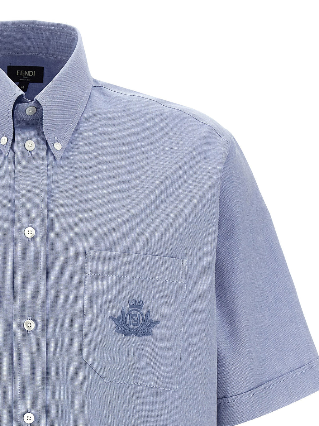 Blouse en coton bleue de Fendi, vêtement élégant avec détails sophistiqués visible sur l'image.
