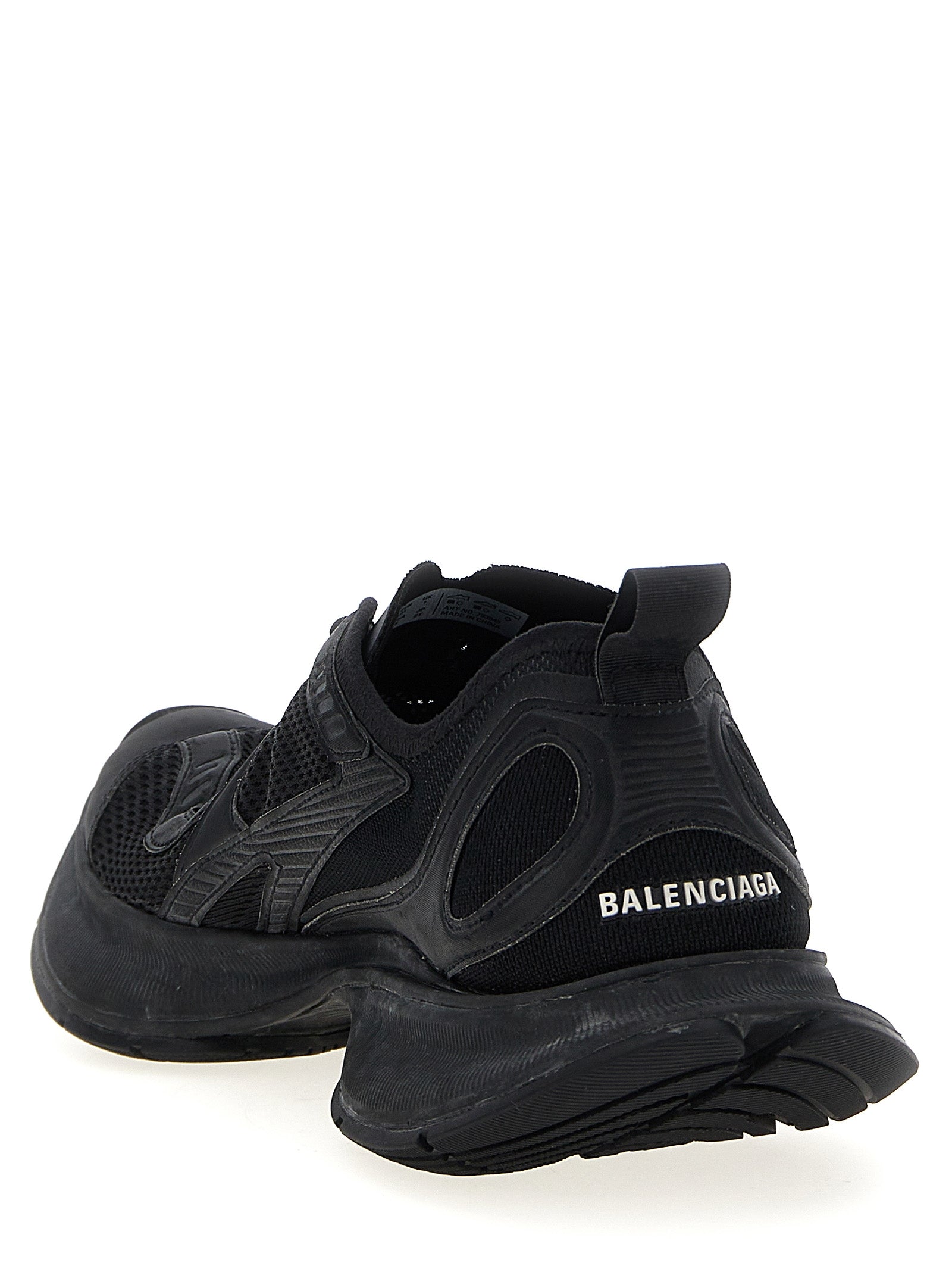 Chaussures de sport noires Balenciaga en polyester, sneakers athlétiques élégants avec design moderne et détails de style urbain.