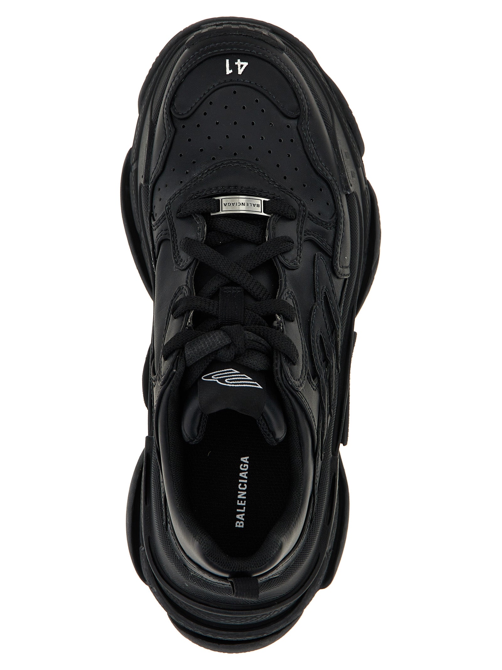 Chaussures de sport Balenciaga en polyéthylène noires, baskets athlétiques modernes et élégantes, visibles en gros plan sur fond neutre.