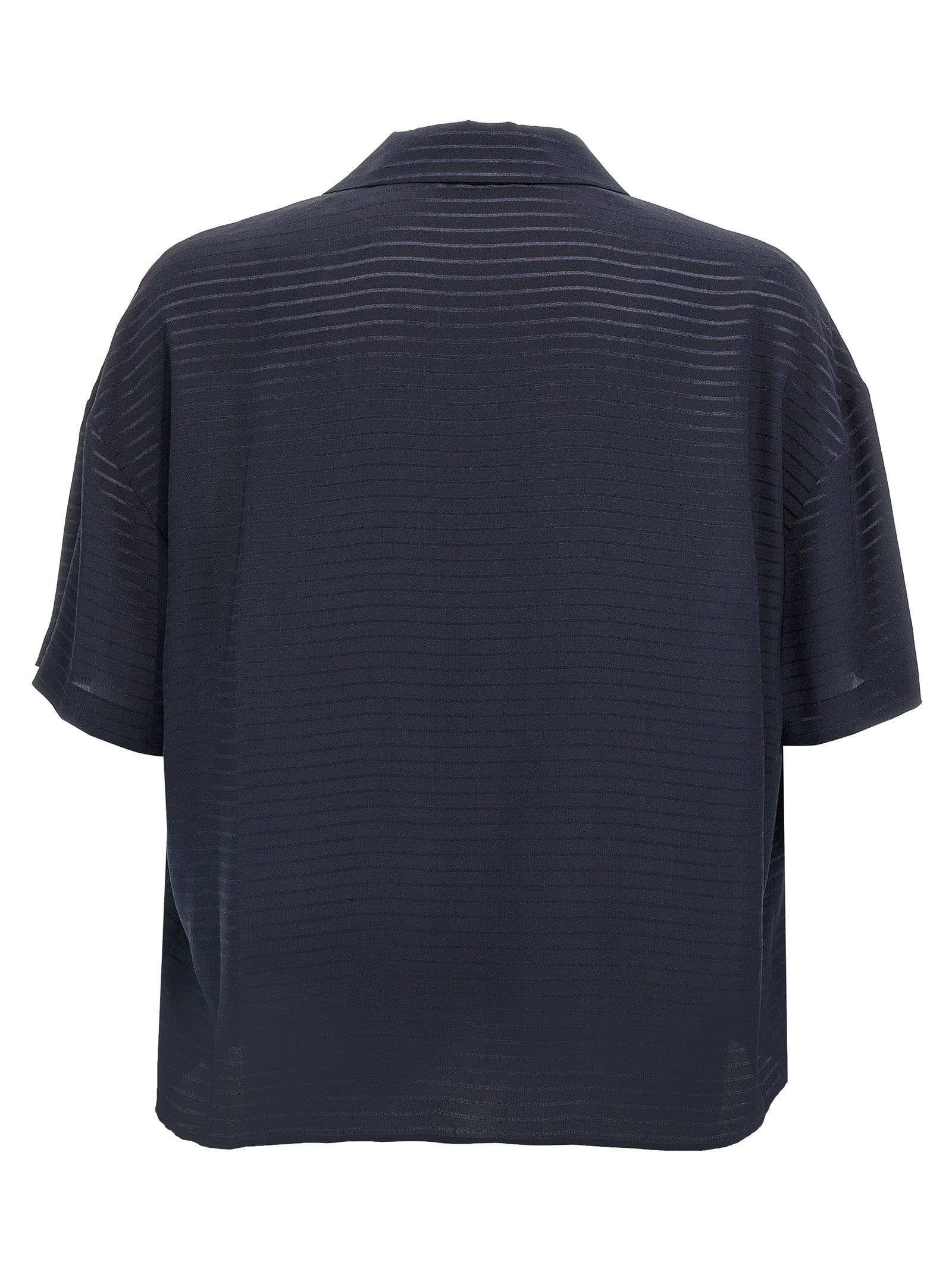 Chemise polo en soie bleue de Saint Laurent, vue de face, avec col classique et logo discret, élégante et sophistiquée.