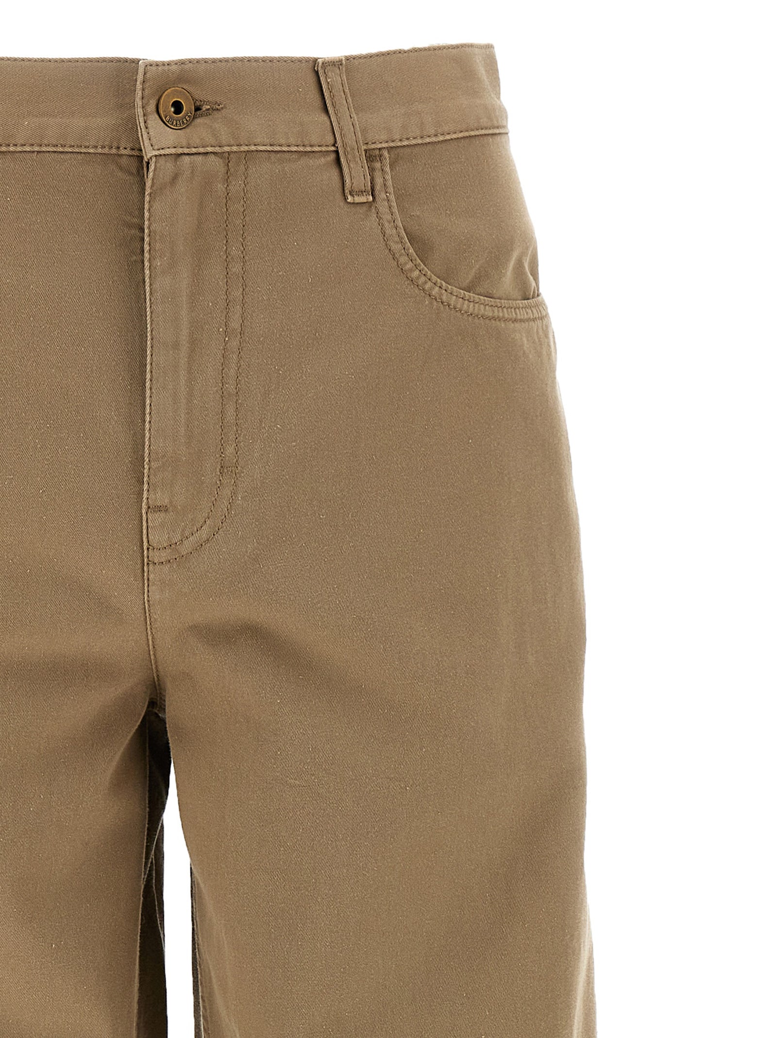 Pantalons décontractés en coton beige de Burberry, silhouette classique et style élégant pour un look casual.