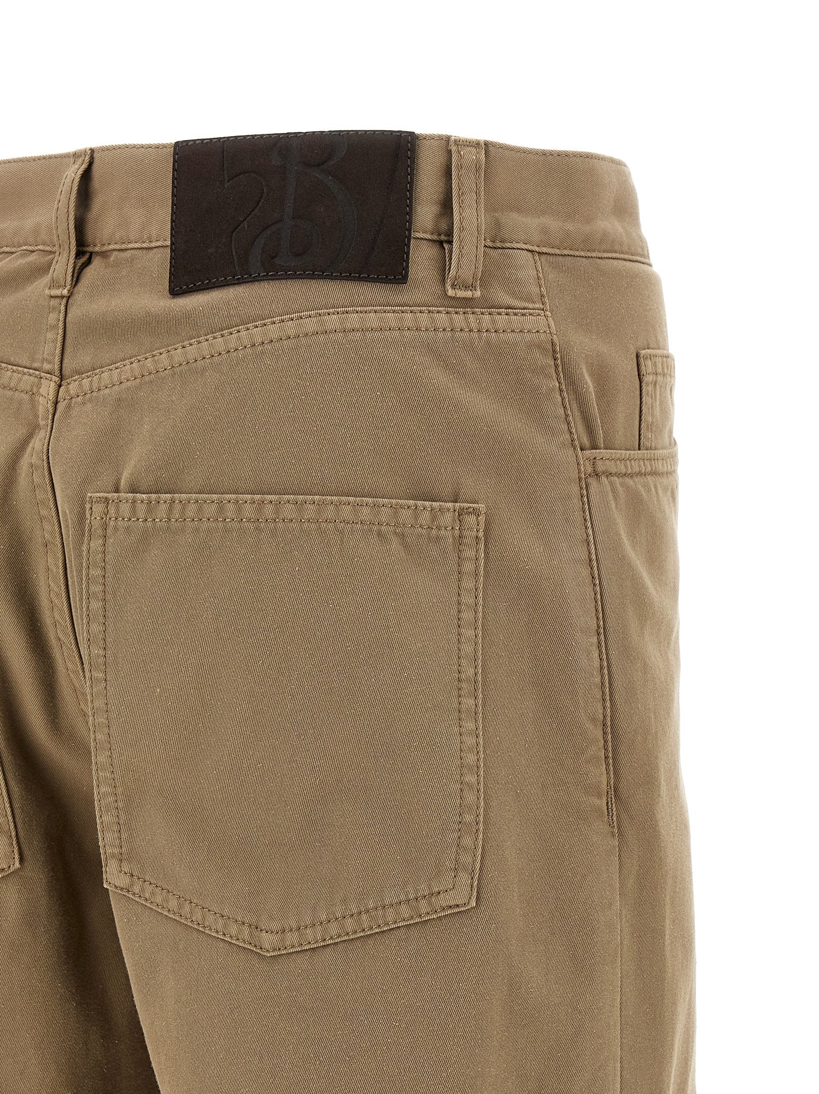 Pantalons décontractés en coton beige de Burberry, style casual, avec coupe confortable et détails élégants.