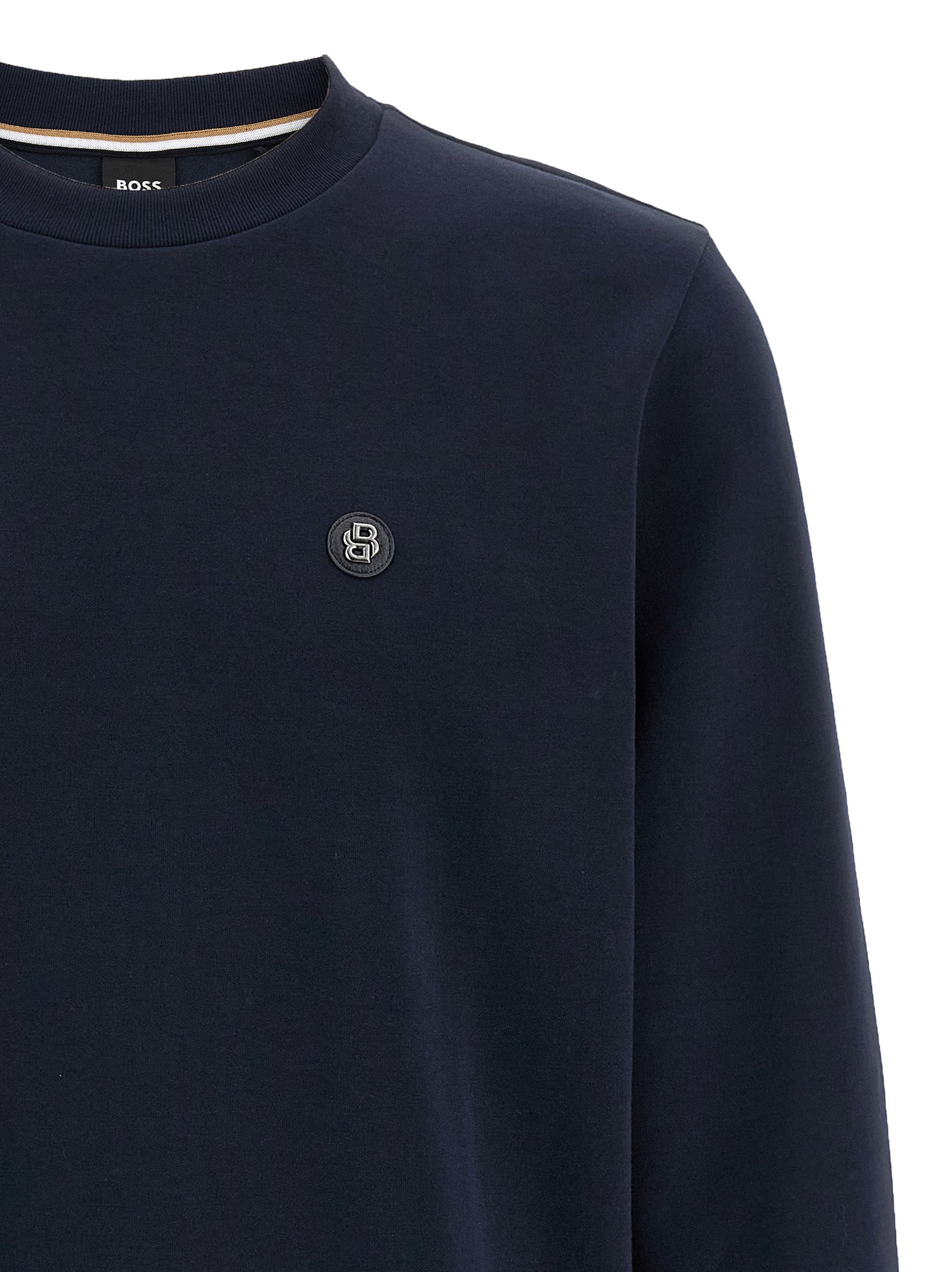 Sweat-shirt en coton bleu de la marque Hugo Boss, coupe décontractée et logo discret sur la poitrine.