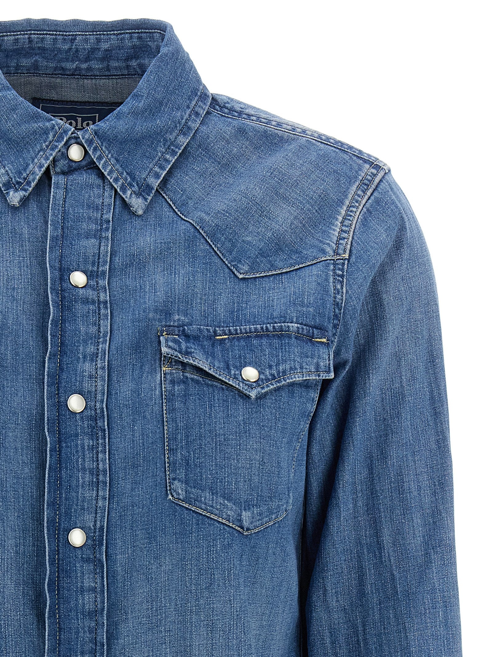 Chemise en coton bleu Polo Ralph Lauren, vue de face, détails du col et des boutons, style classique et élégant.