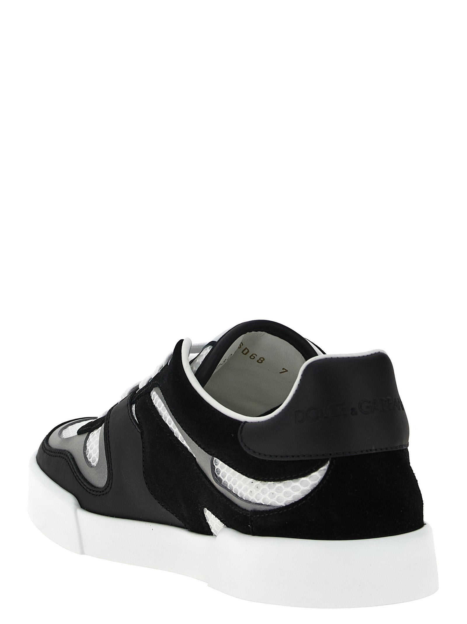 Sneakers bicolores en cuir de veau Dolce & Gabbana, chaussures décontractées avec design élégant et style moderne.