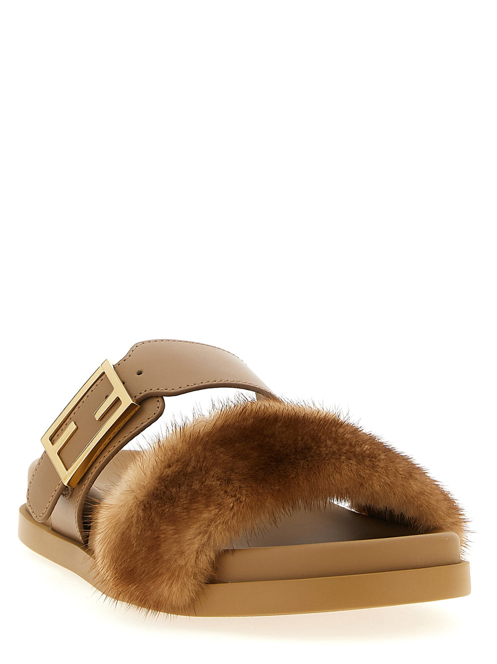 Sandales en cuir marron Fendi, style slide avec design élégant et confort optimal, visibles en gros plan.