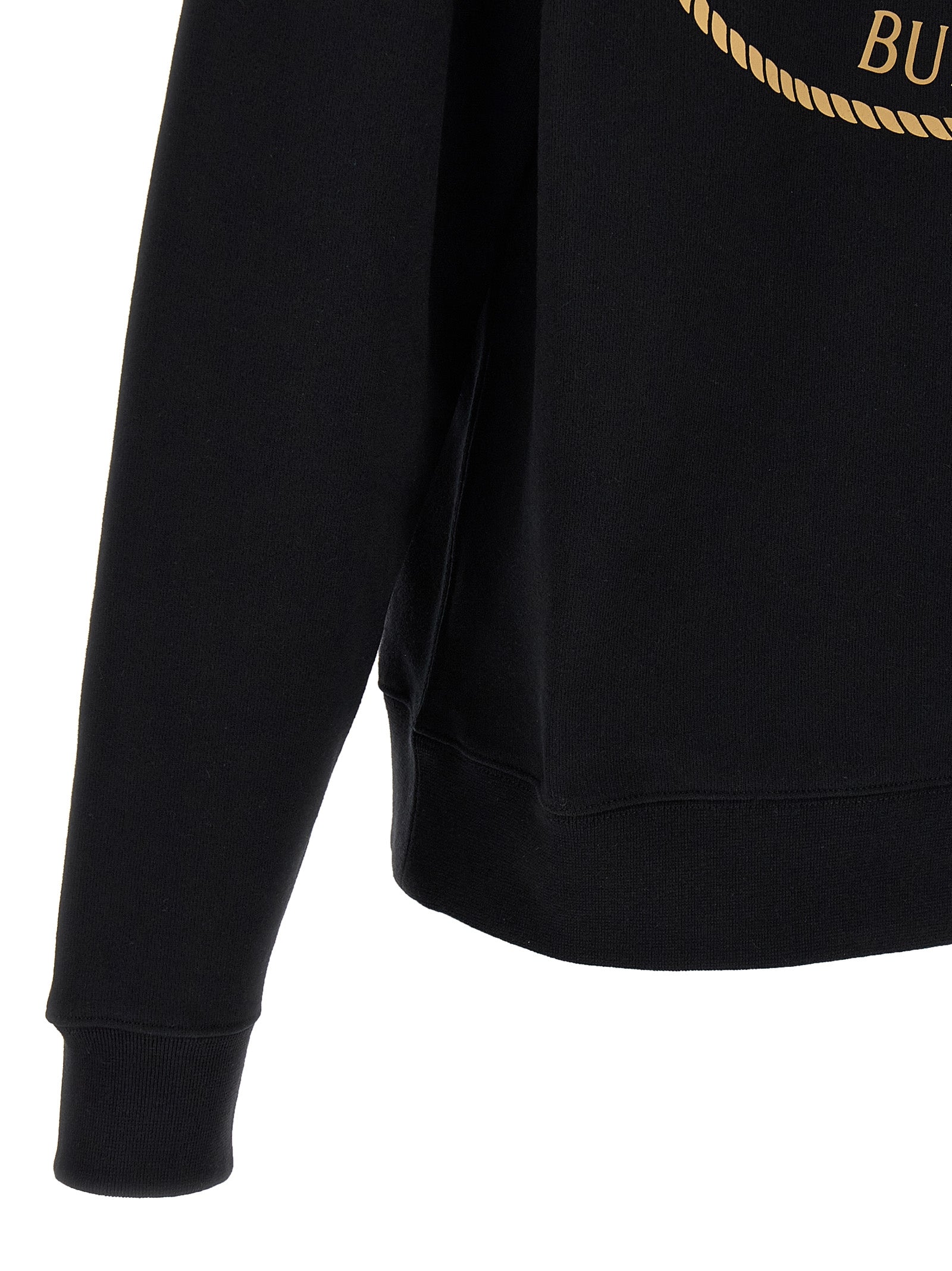 Sweatshirt en coton noir de Burberry, style décontracté avec logo discret, porté sur un modèle.