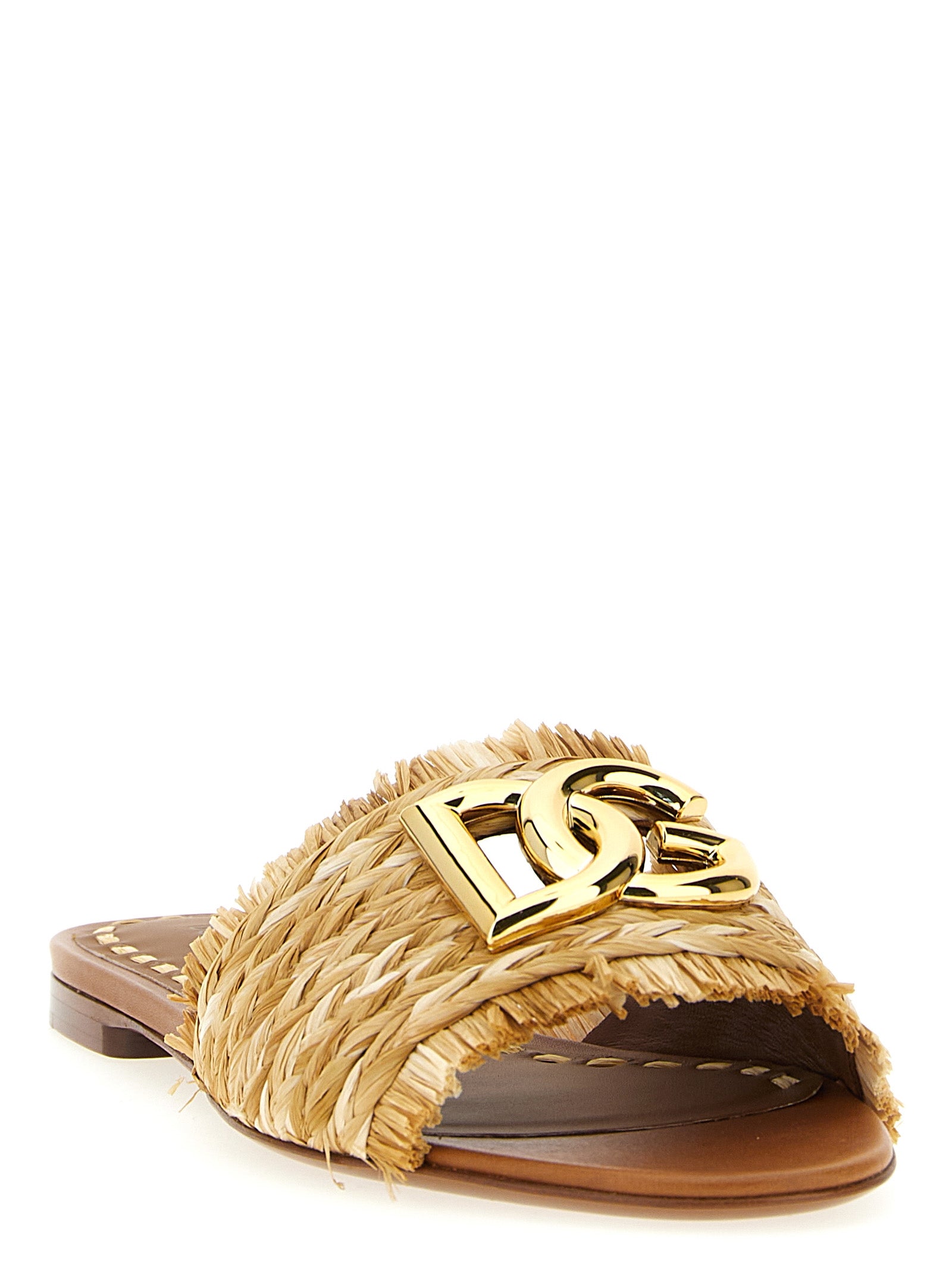Sandales en raffia marron de Dolce & Gabbana, vue de face, avec détails en tissu et semelle en caoutchouc.