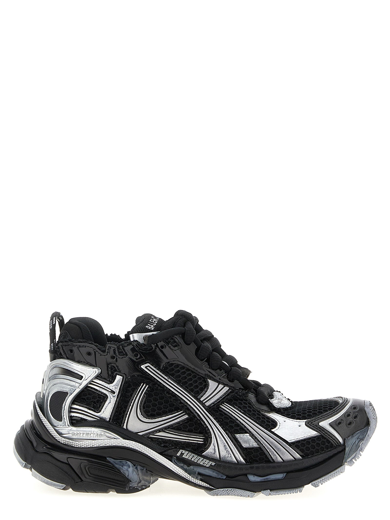 Chaussures de sport Balenciaga en polyéthylène noires avec design moderne et épuré, adaptées pour un style décontracté.