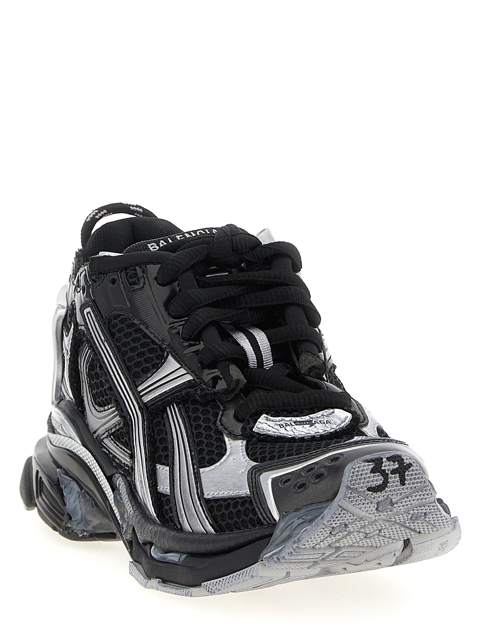 Chaussures de sport Balenciaga en polyéthylène noires, sneakers athlétiques avec design moderne et style élégant.