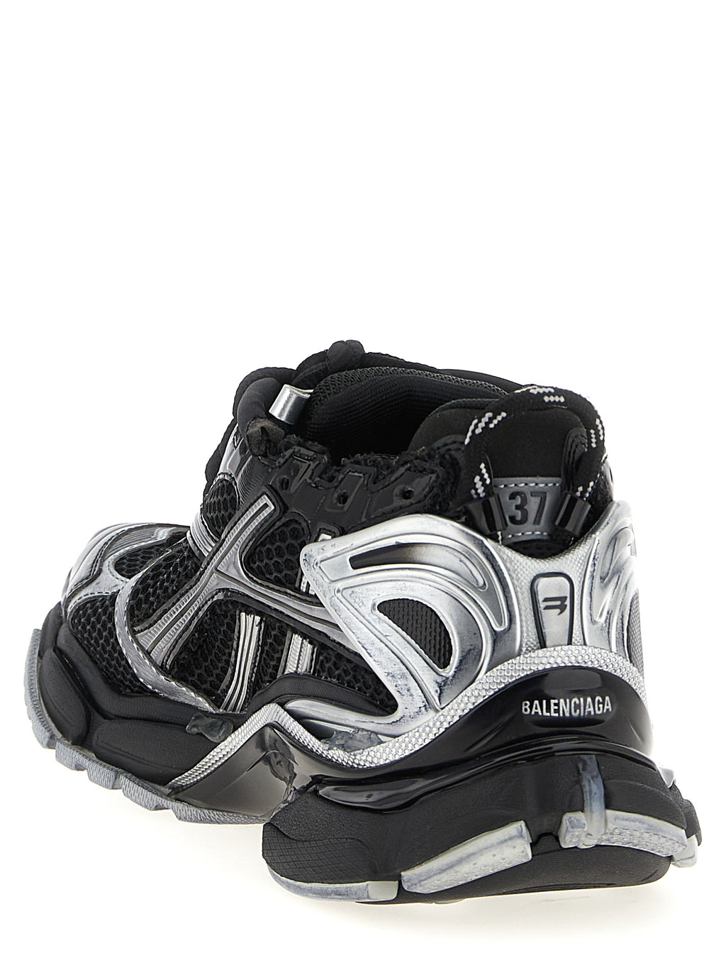 Chaussures de sport Balenciaga en polyéthylène noire, sneakers athlétiques modernes et élégants, vues de face sur fond blanc.