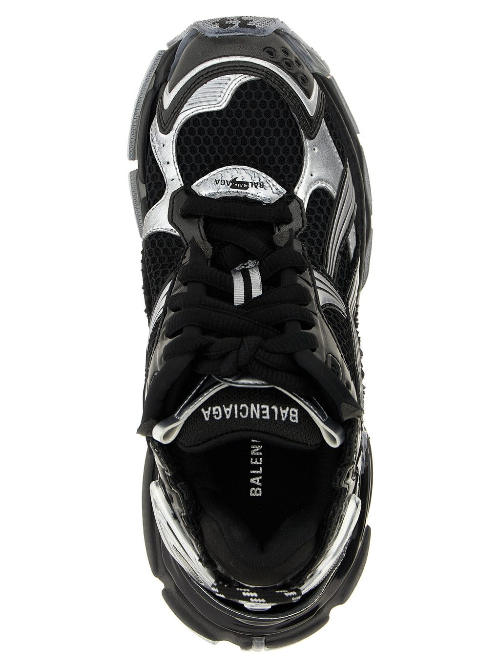 Chaussures de sport Balenciaga en polyéthylène noir, baskets athlétiques modernes avec design innovant et semelle épaisse.