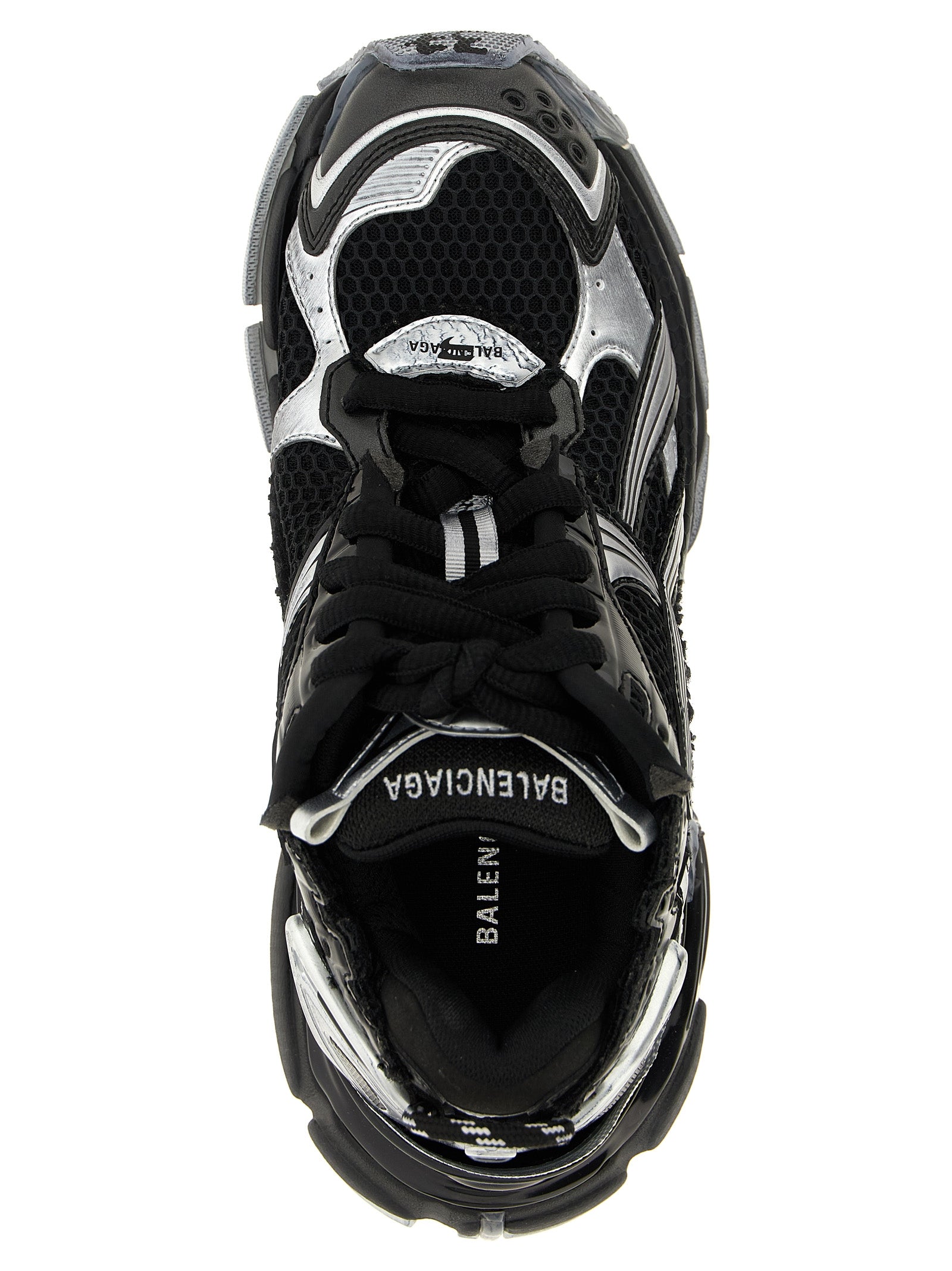 Chaussures de sport Balenciaga en polyéthylène noir, baskets athlétiques modernes avec design innovant et semelle épaisse.