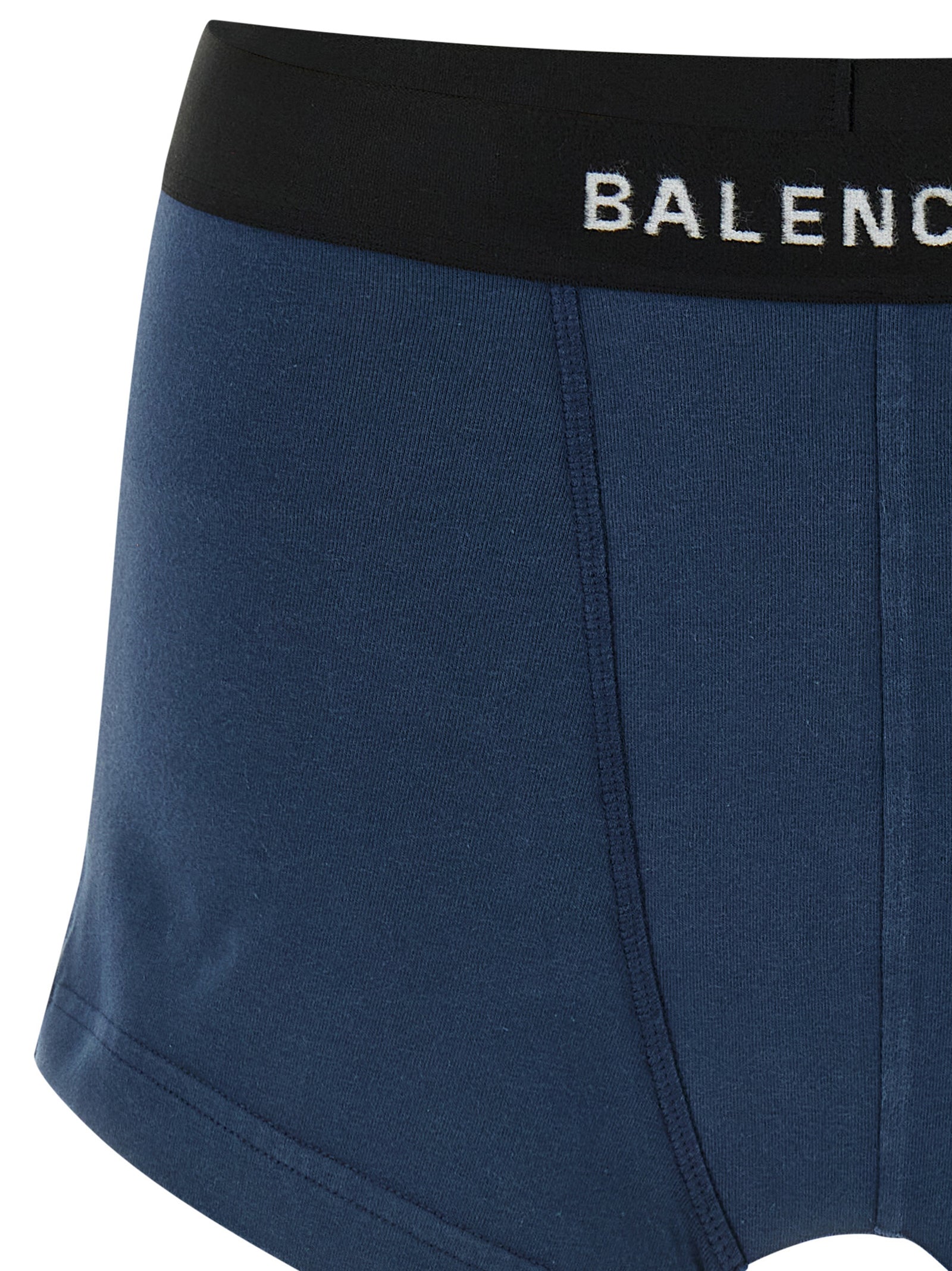 Jupe longue en coton bleue de la marque Balenciaga, coupe fluide et élégante, visible avec détails de couture.