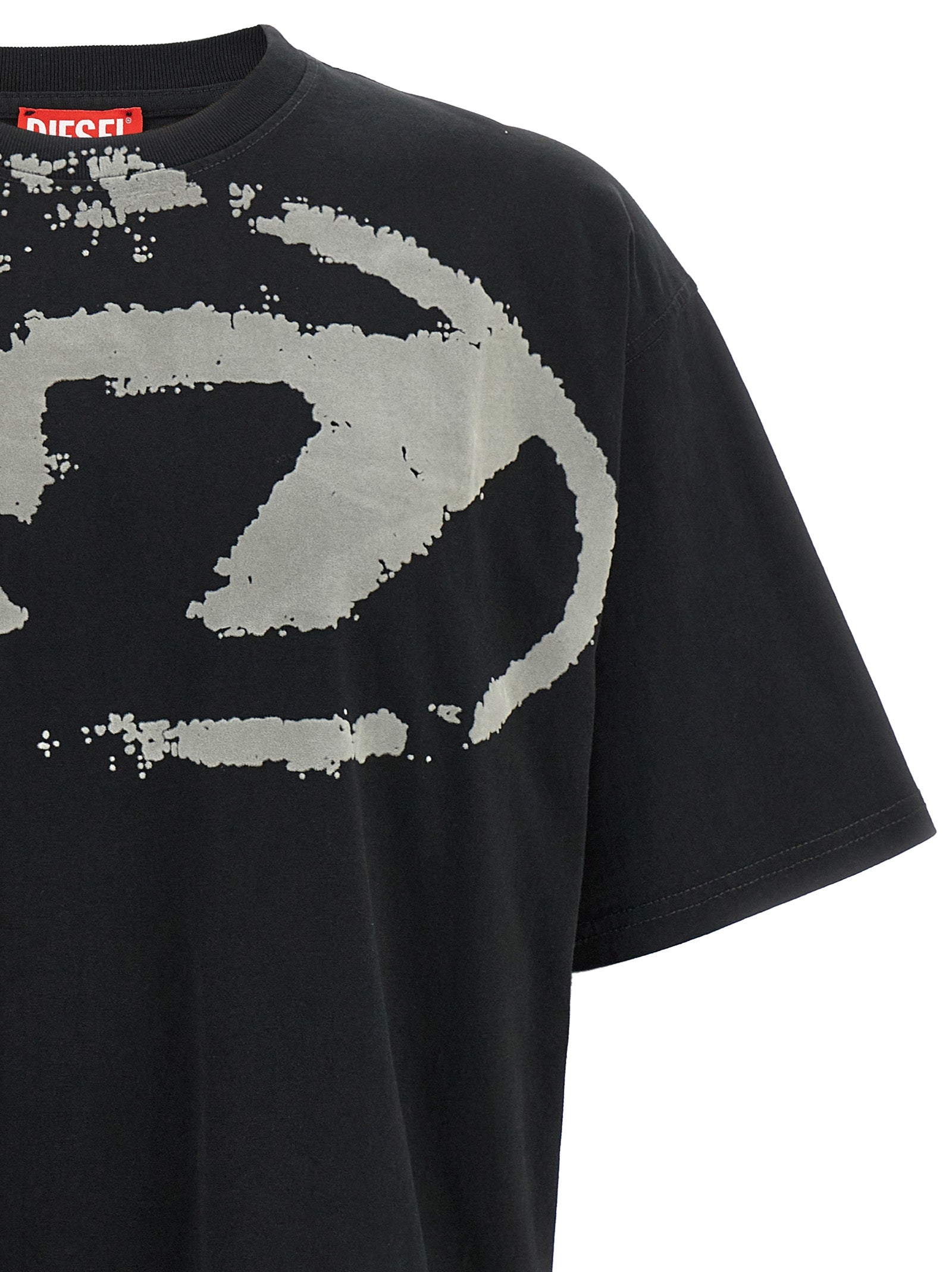 T-shirt en coton noir Diesel, style décontracté avec logo Diesel visible sur la poitrine.