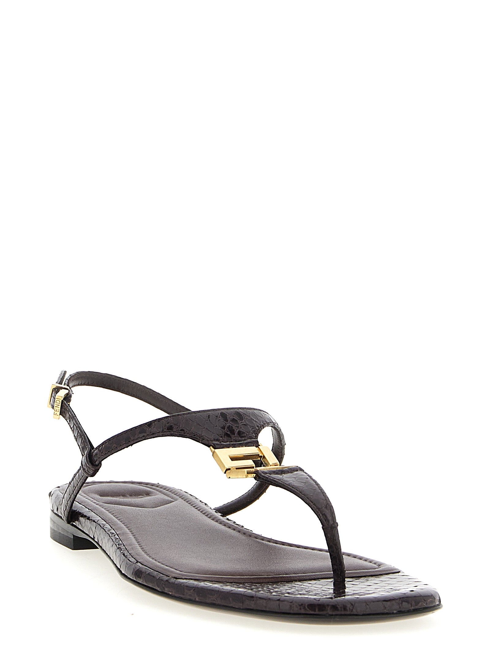 Sandales plates Fendi en élasthanne violette, avec design élégant et confort visible sur l'image.