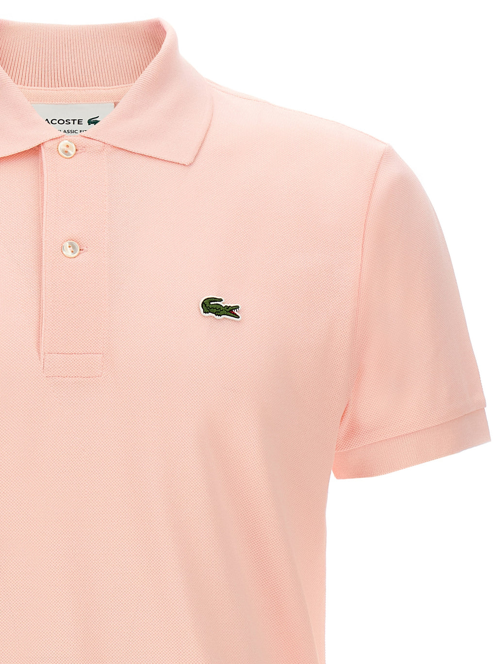 Chemise polo en coton multicolore Lacoste, manches courtes avec col classique, logo crocodile sur la poitrine.