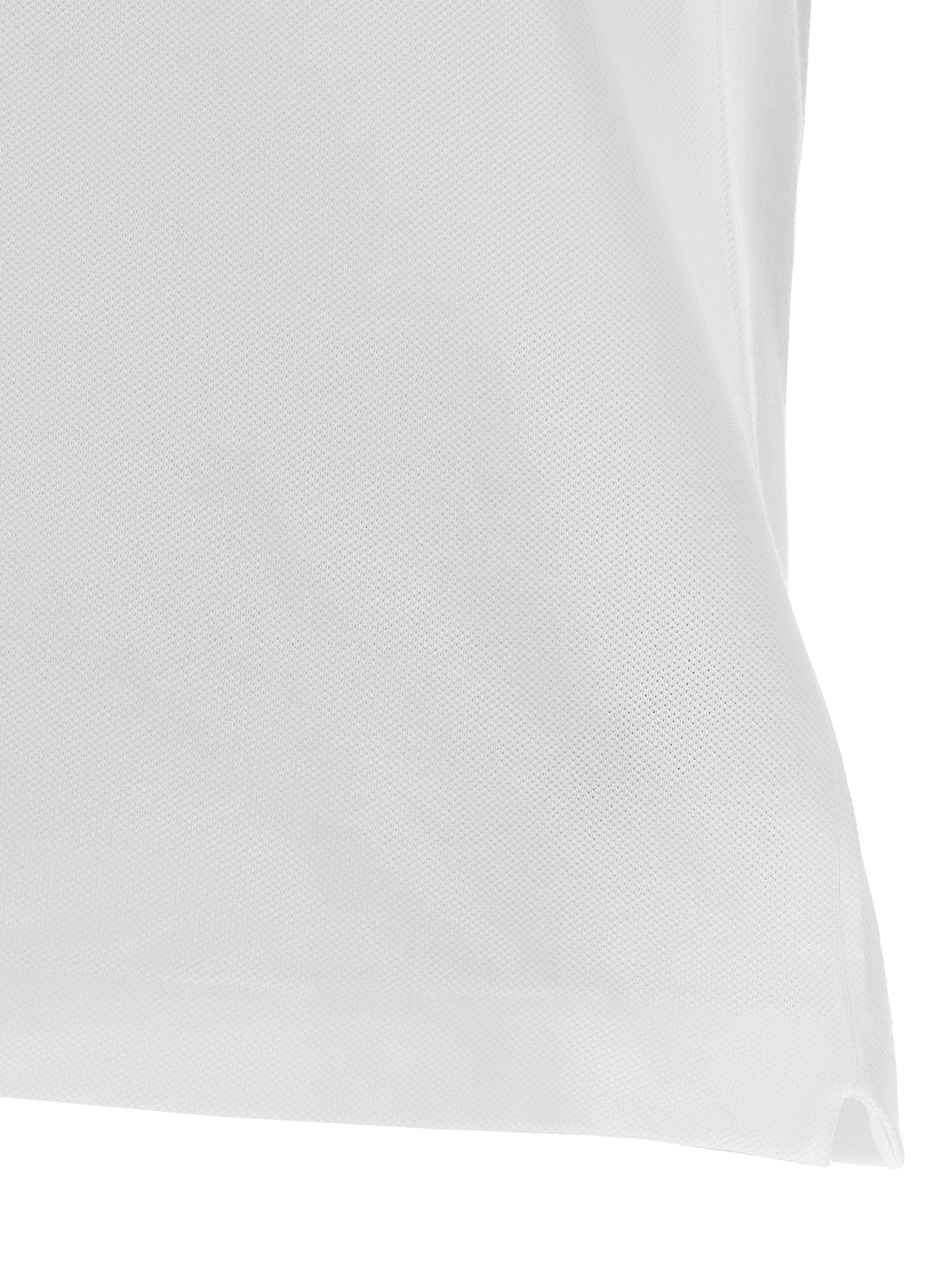 Chemise polo blanche en coton Lacoste, détails du col et du logo crocodile, tissu doux et confortable.