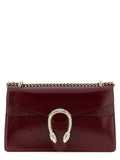 Sac à bandoulière Gucci en cuir de veau multicolore, avec détails colorés et design élégant.