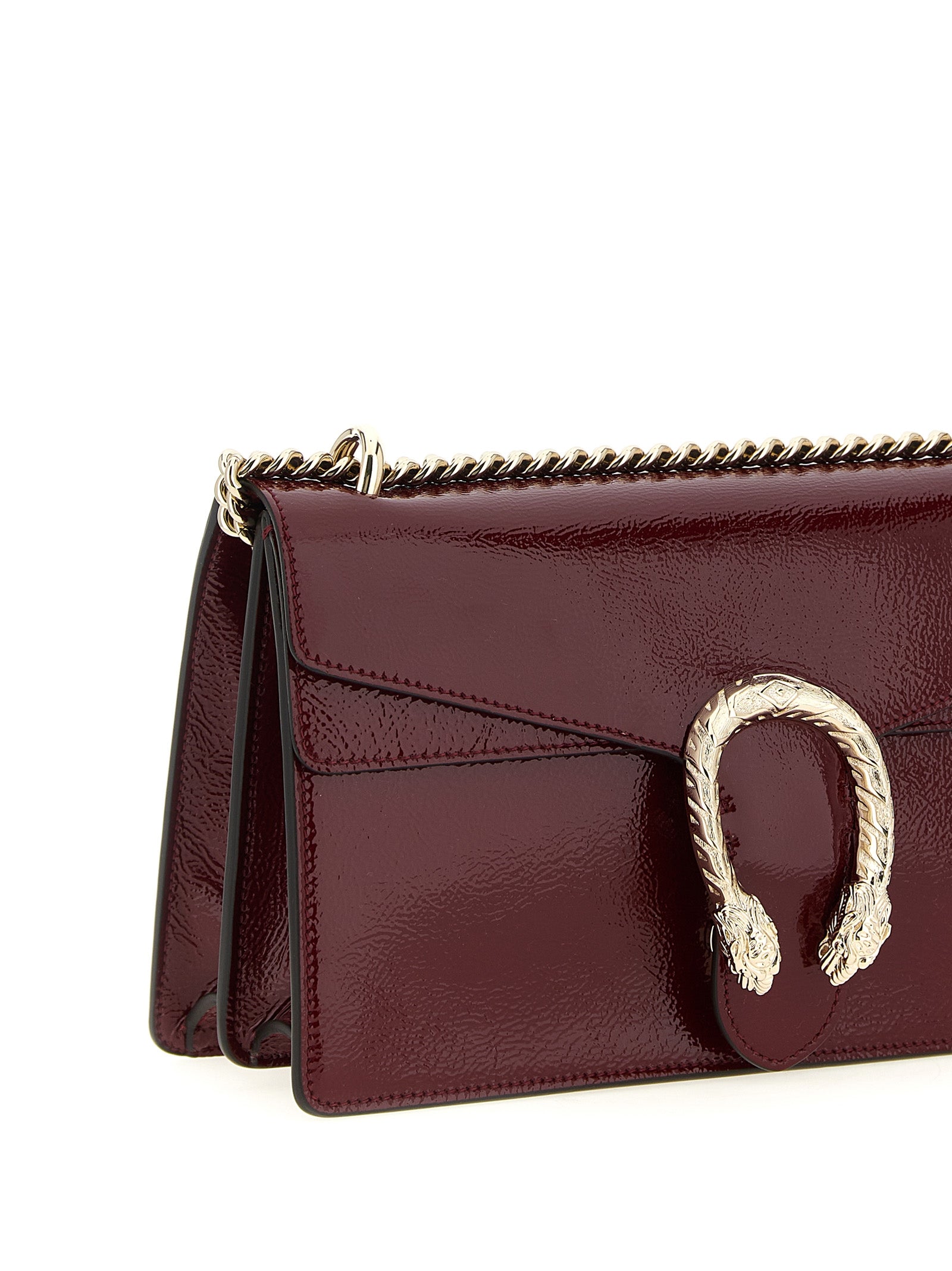 Sac à bandoulière Gucci en cuir de veau multicolore, avec logo emblématique et design élégant.