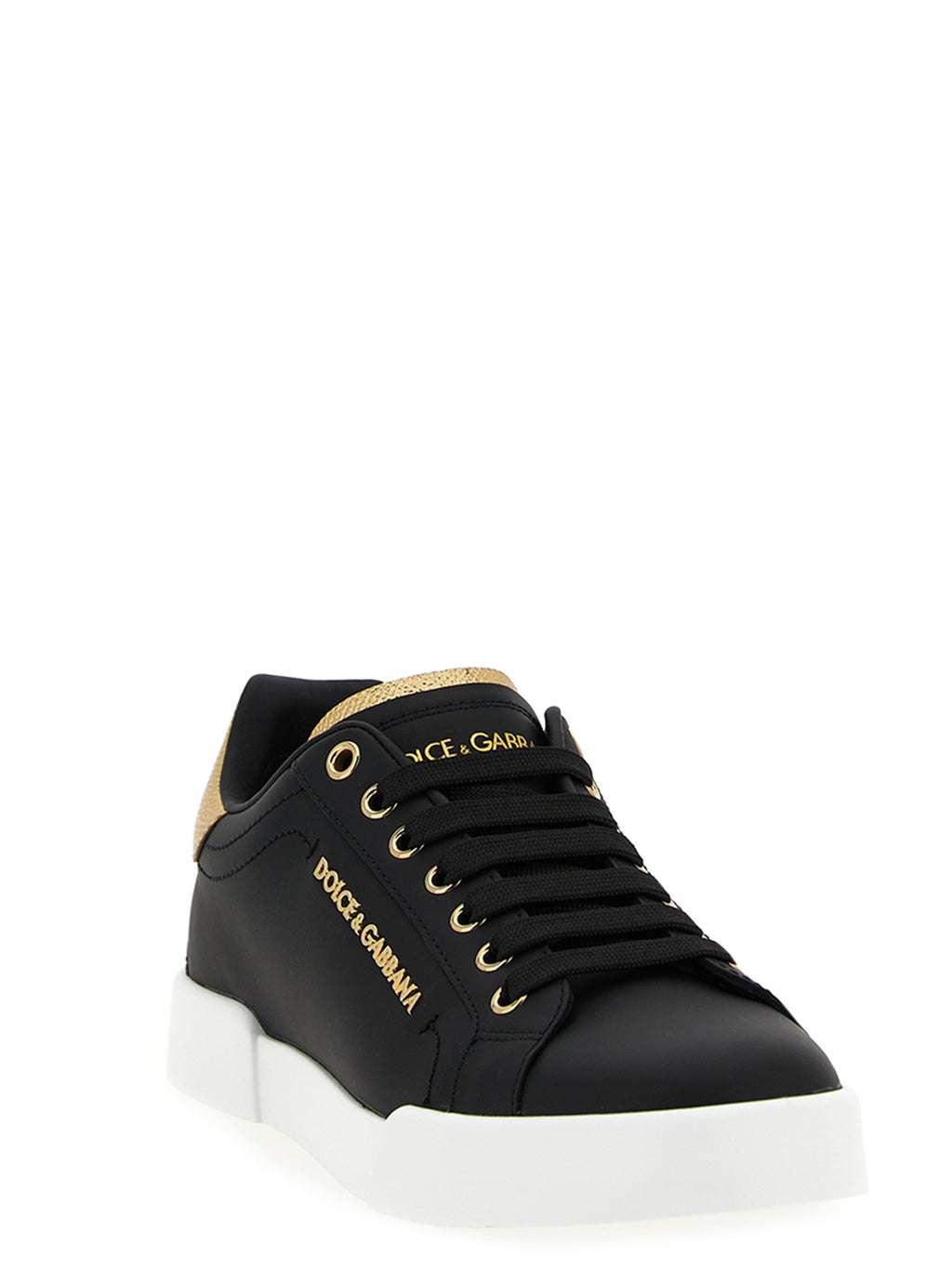 Sneakers noires en cuir de veau Dolce & Gabbana, style décontracté avec semelle blanche et design élégant.