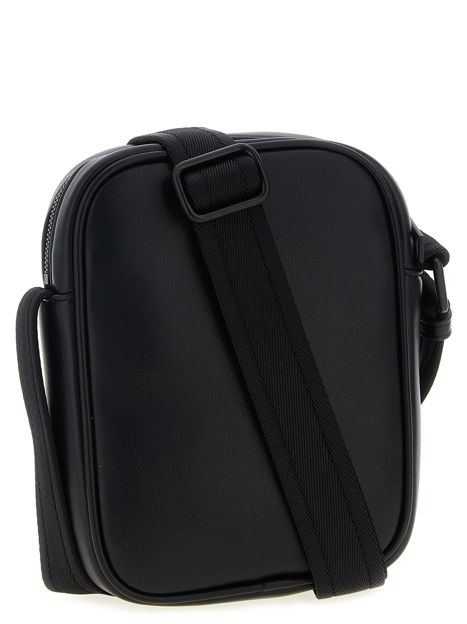Sac bandoulière en polyéthylène noir Diesel, avec logo Diesel visible, mode pratique et moderne pour le quotidien.