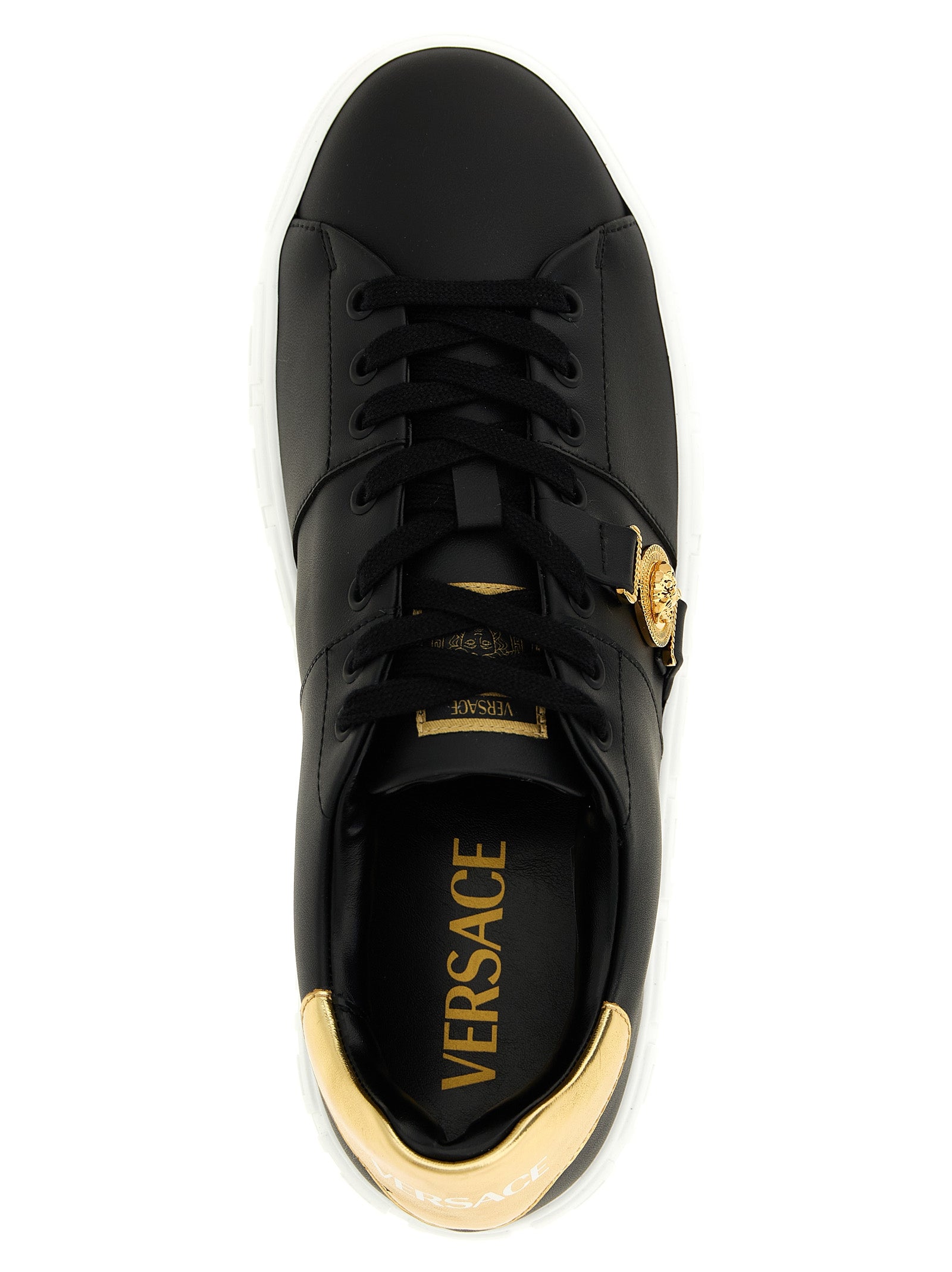Chaussures basses en nylon noir de Versace, sneakers low top avec design élégant et logo distinctif.