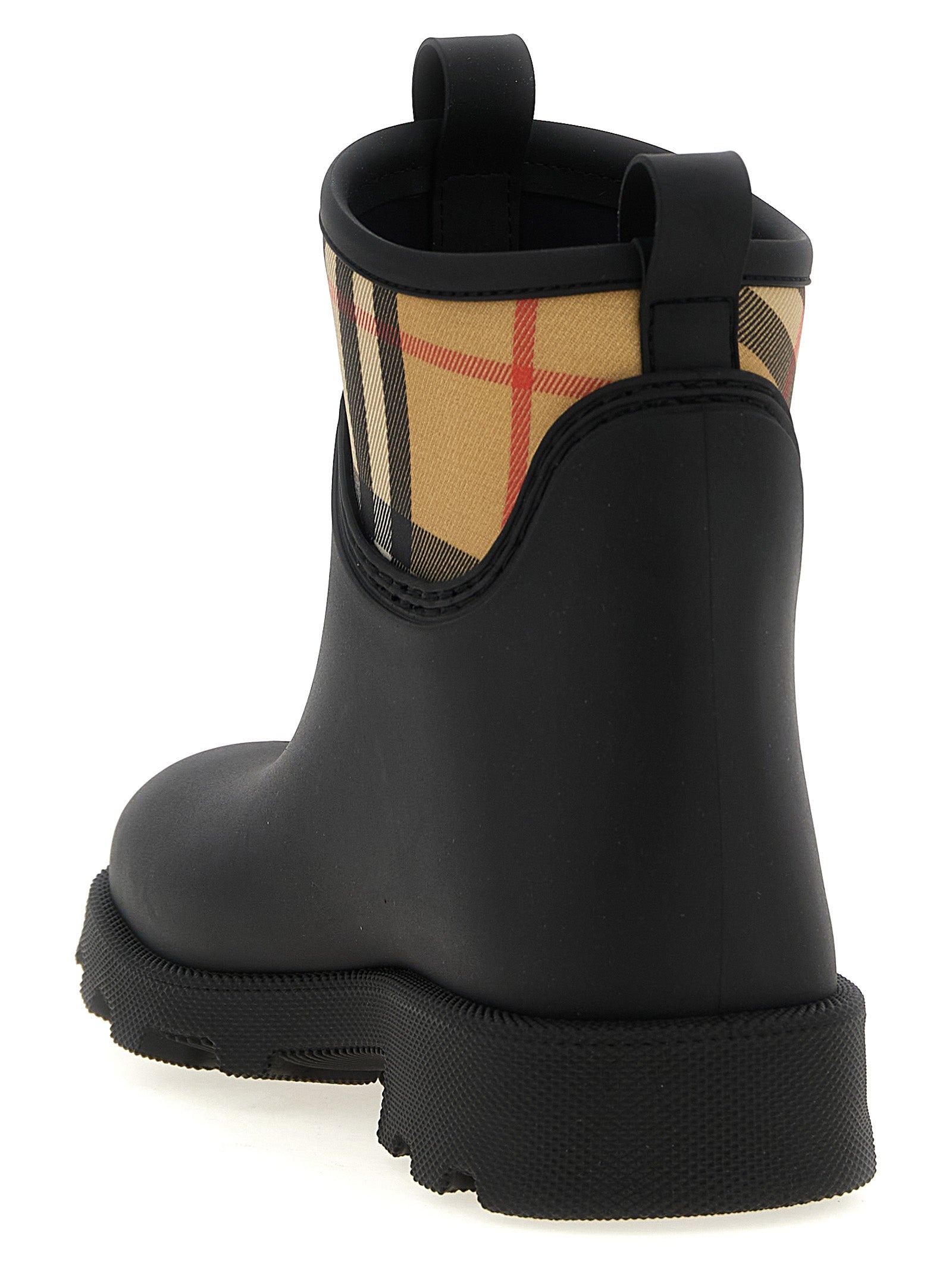 Bottes ankle en caoutchouc noir de Burberry, imperméables avec logo distinctif, pour un style chic et pratique.