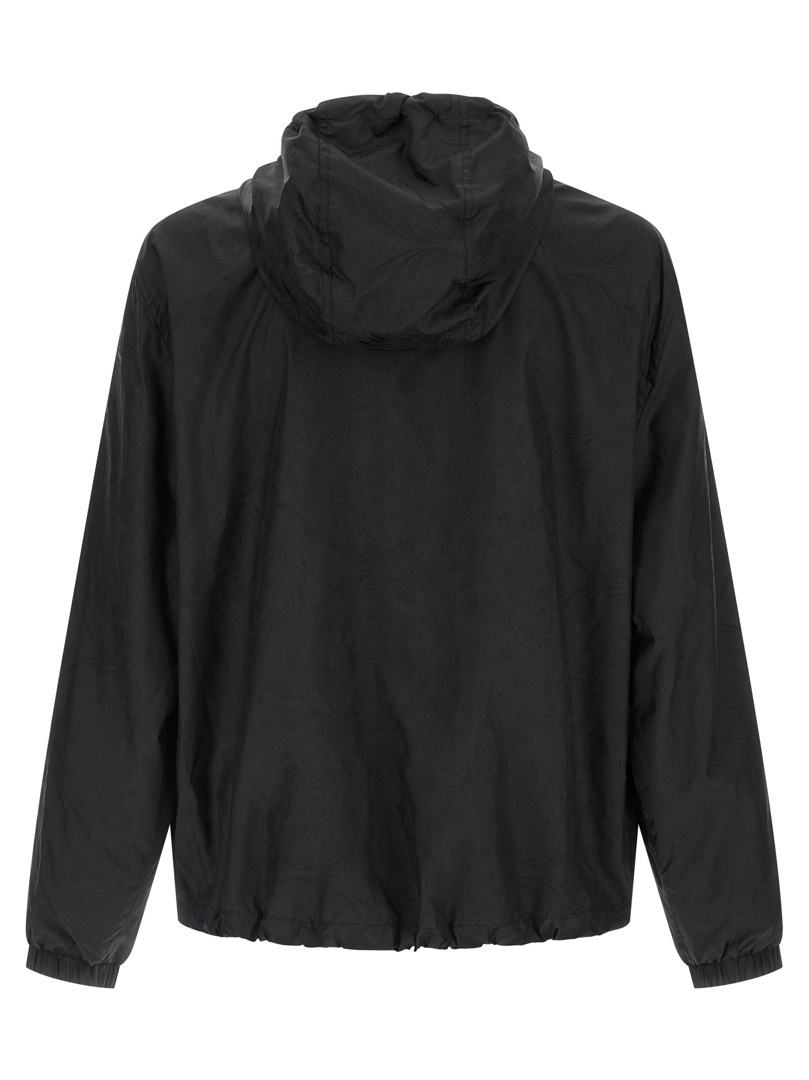 Veste en nylon noir Versace, coupe moderne, avec logo emblématique, détails élégants et fermeture éclair.
